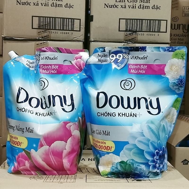 Nước xả vải Downy 3L nắng mai, làn gió mát giúp quần áo thơm lâu hơn.