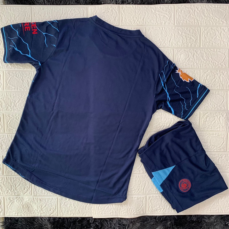 Quần áo bóng đá MANCHESTER CITY bản sân khách màu xanh đen phối hoạ tiết xanh dương vải mè cao cấp mùa giải 2023-2024