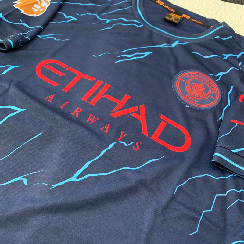 Quần áo bóng đá MANCHESTER CITY bản sân khách màu xanh đen phối hoạ tiết xanh dương vải mè cao cấp mùa giải 2023-2024