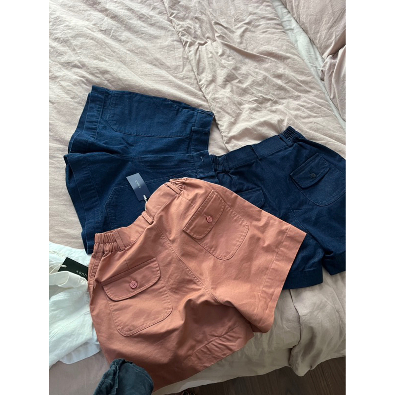 Quần short denim túi nắp cài