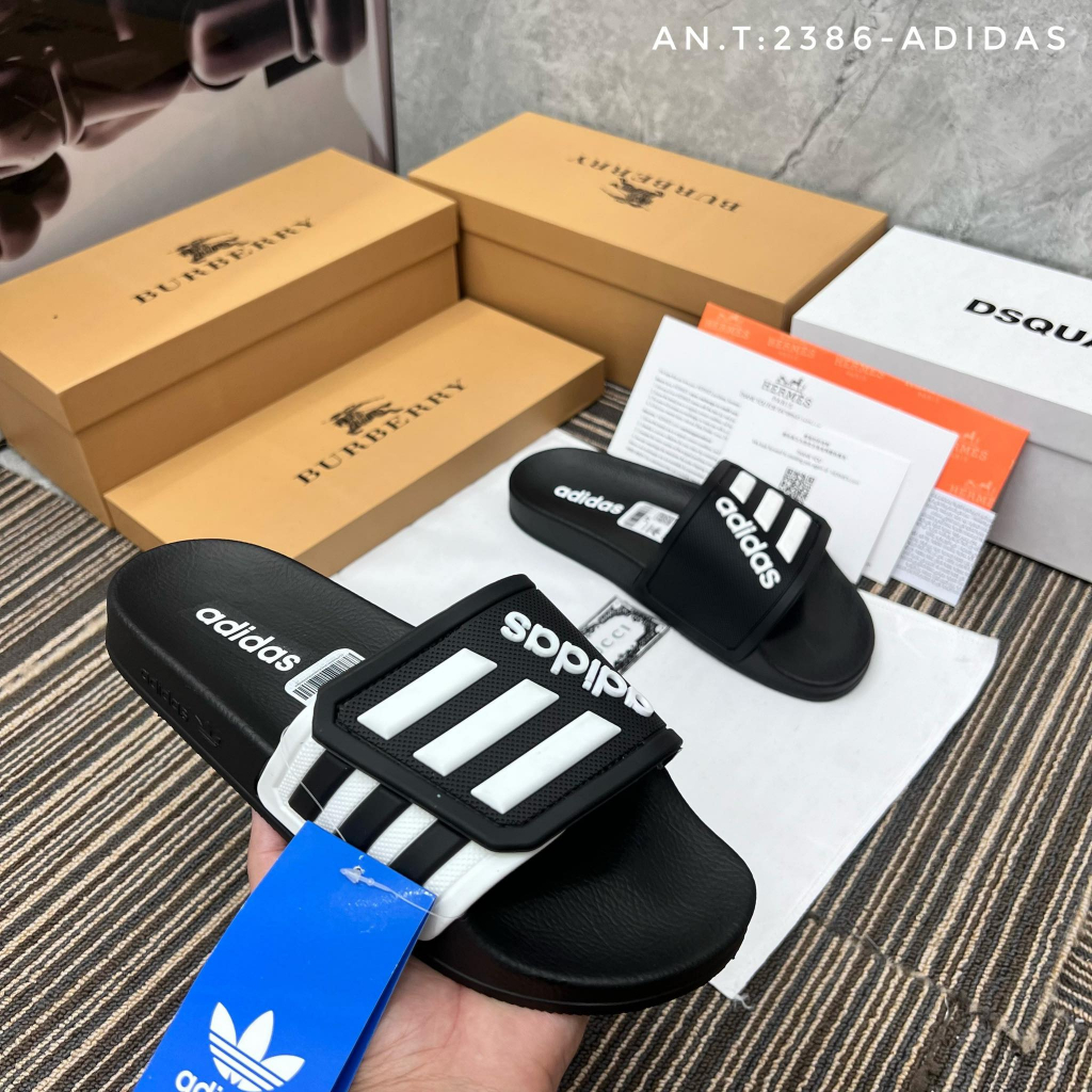 Dép adidas quai khâu mẫu mới 3 sọc 2 màu đen vàng - new 2023