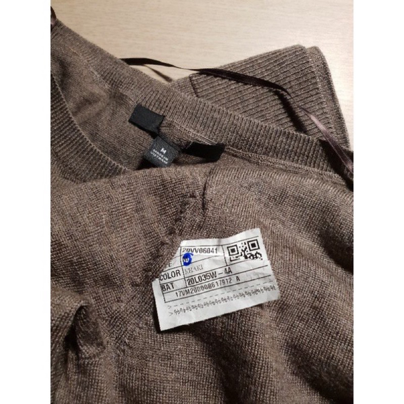 Váy len dệt kim Uniql0