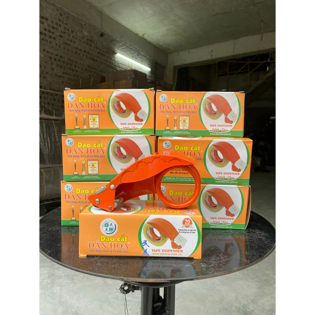 Cắt băng dính cầm tay cho loại 0,5kg đến 1kg