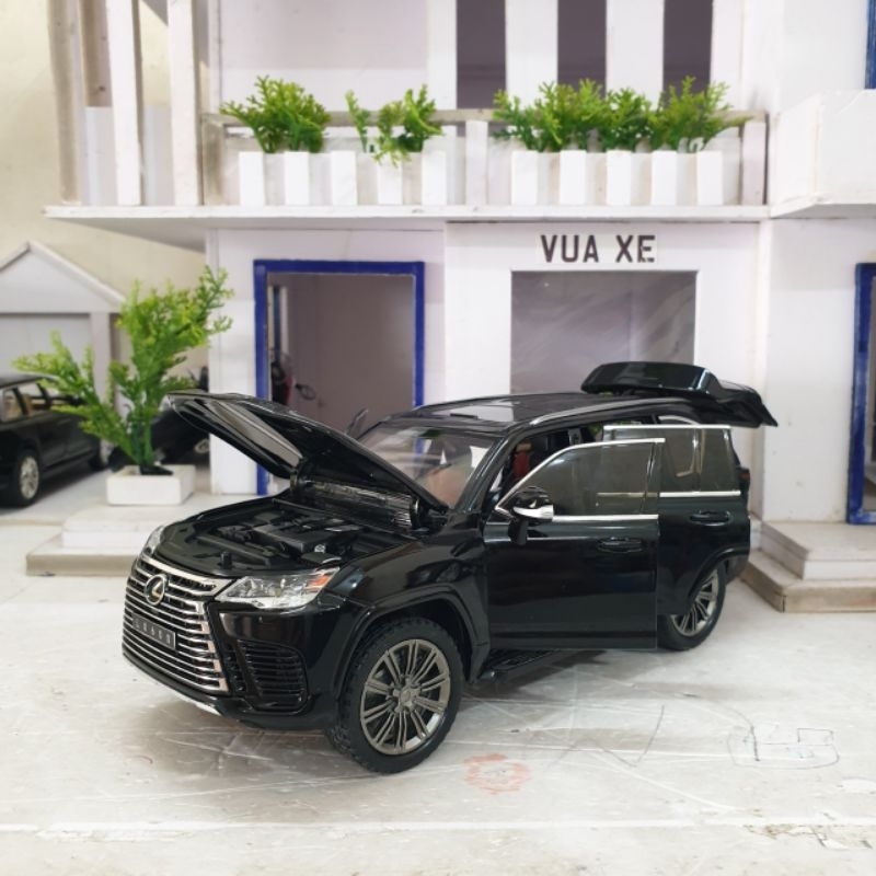 Mô hình xe Lexus LX600 tỉ lệ 1:24 bản mới có đánh lái, còi, trượt ghế, nhún, full kính và chạy cót