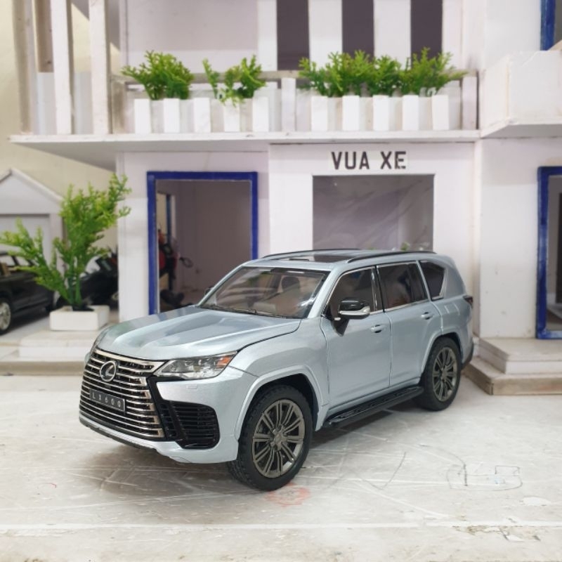 Mô hình xe Lexus LX600 tỉ lệ 1:24 bản mới có đánh lái, còi, trượt ghế, nhún, full kính và chạy cót