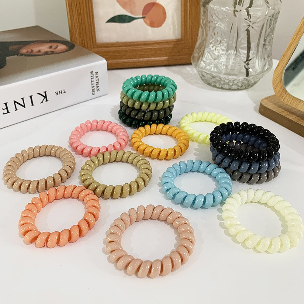 Dây buộc tóc lò xo nhiều màu sắc Pastel giao màu ngẫu nhiên