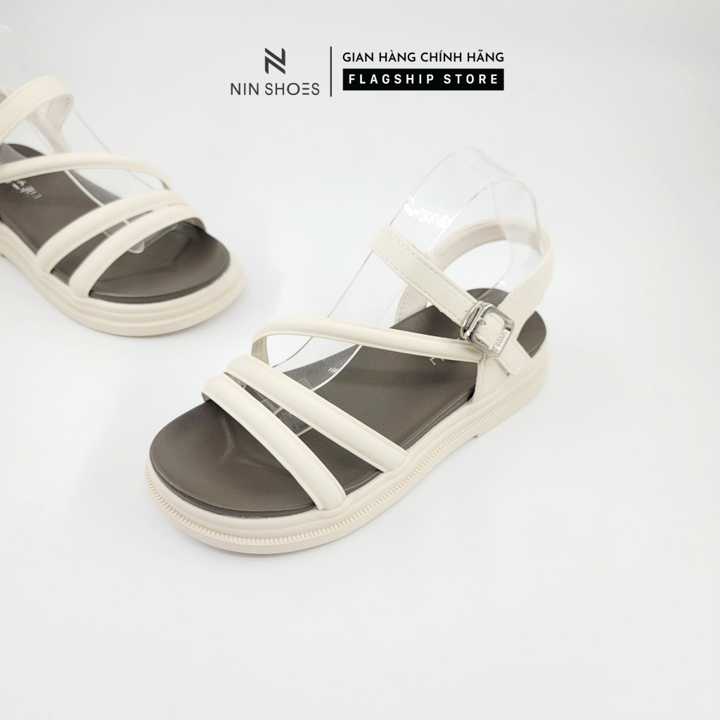 Dép đế bằng 4 cm Ninshoes mũi tròn dây đan chéo quai ngang khoá cài hông