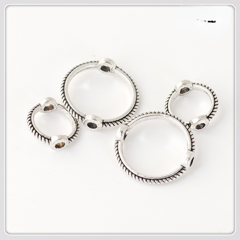 Charm khung đá bọc hạt hình tròn - KL231