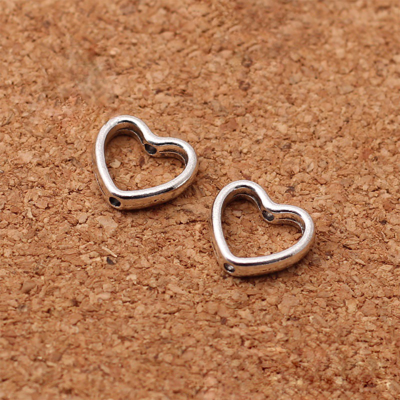 Charm khung đá bọc hạt hình trái tim - KL233