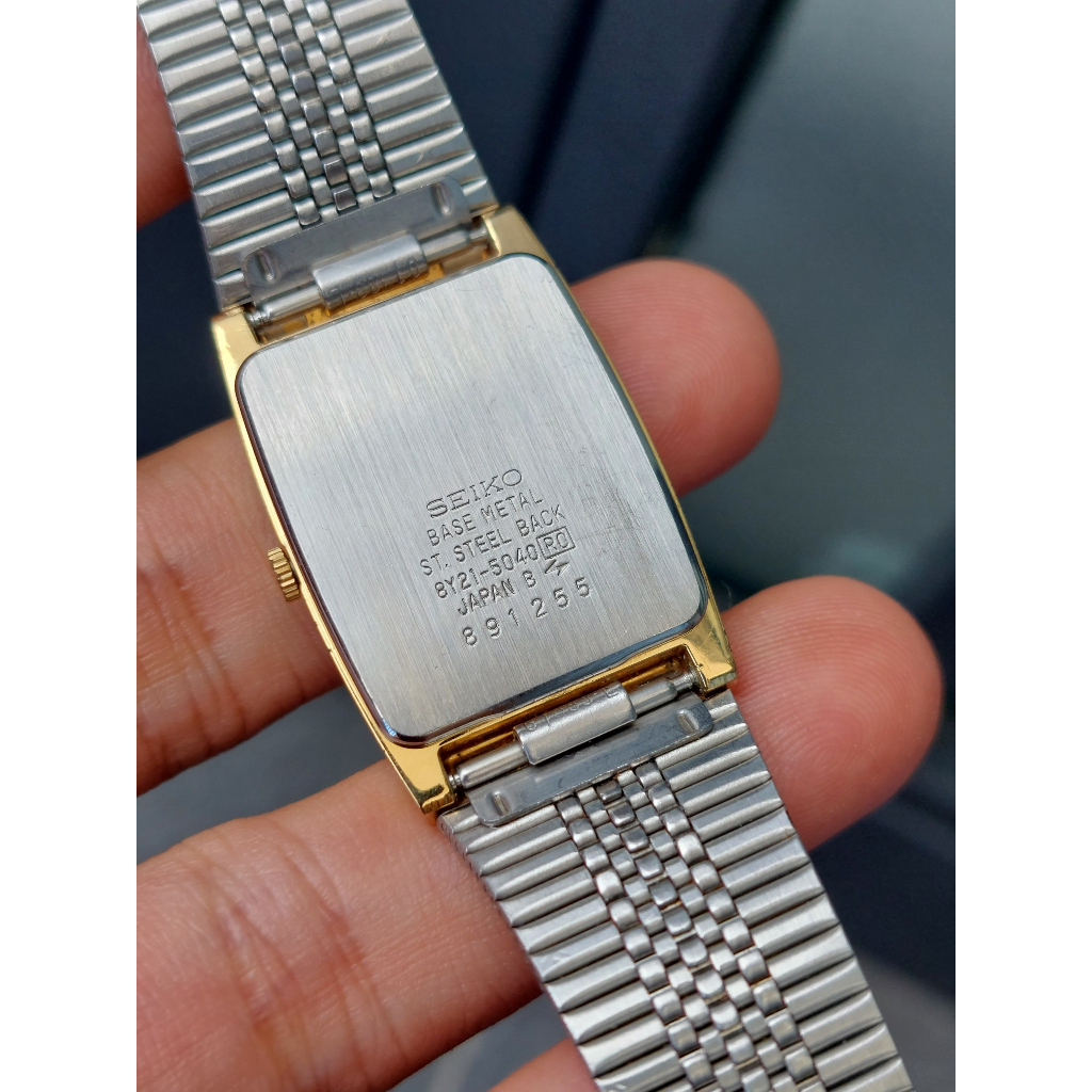 Đồng hồ nam Seiko mặt tank sọc vàng chạy pin hàng Si