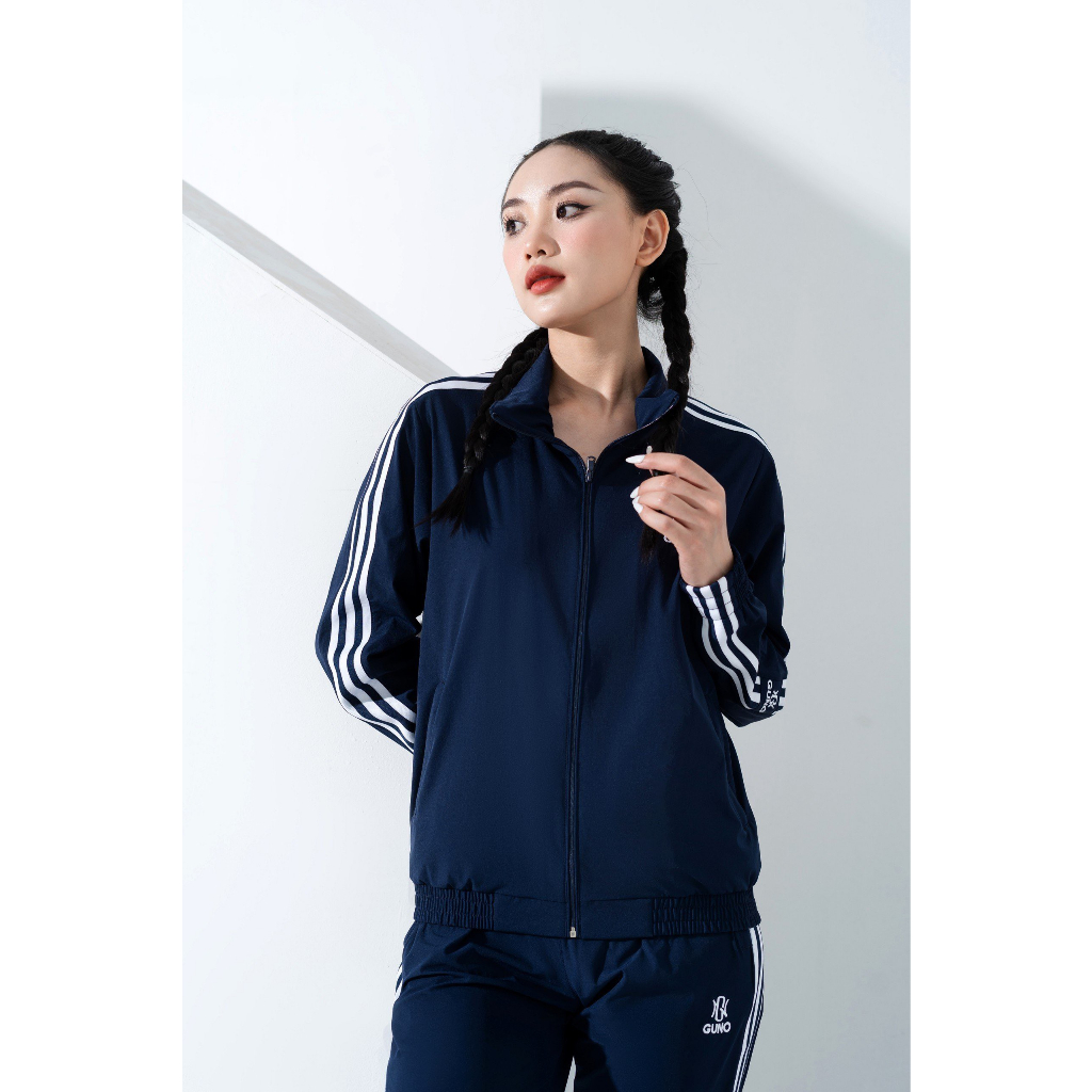 Bộ gió nữ thể thao GUNO thu đông sọc bản to 23DBNU04