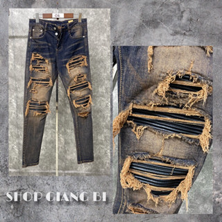 Quần jean vá da đen cứng rách tua màu nâu,quần bò màu nâu bẩn amiri vá da đen nhăn cứng 4 khuy