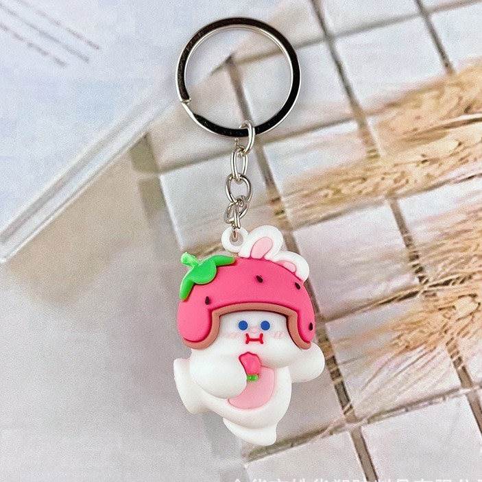 Móc khóa đội mũ hồng vận động và giác quan của bé