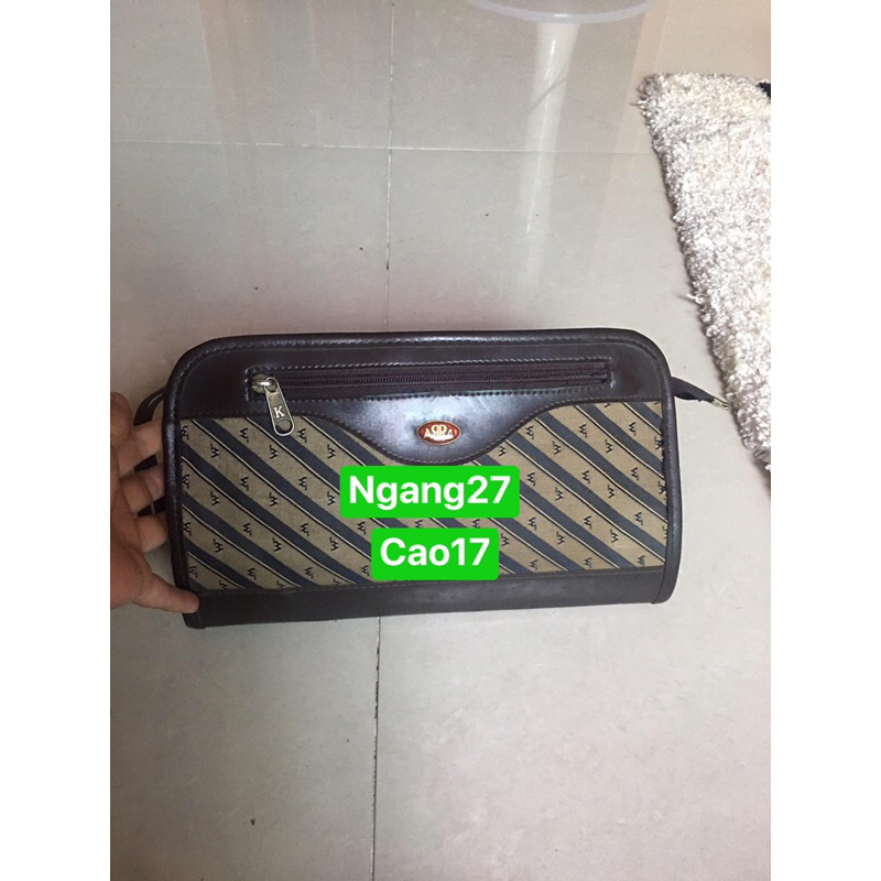 túi si cầm tay y hình hàng cổ
