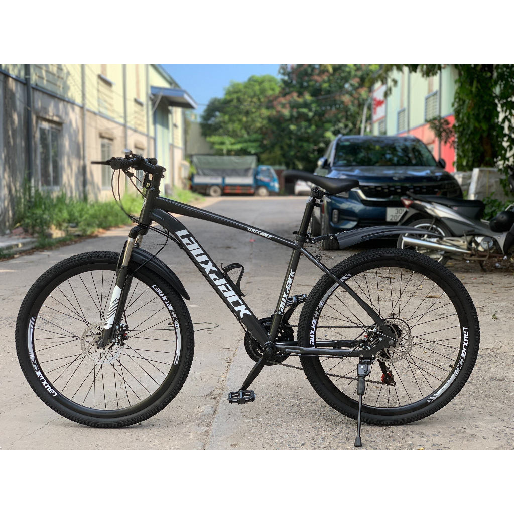 Xe đạp ngoài trời Laux Jack có giảm sốc, kèm chắn bùn, còi, đèn phản quang, bánh 26inch, 21 tốc độ