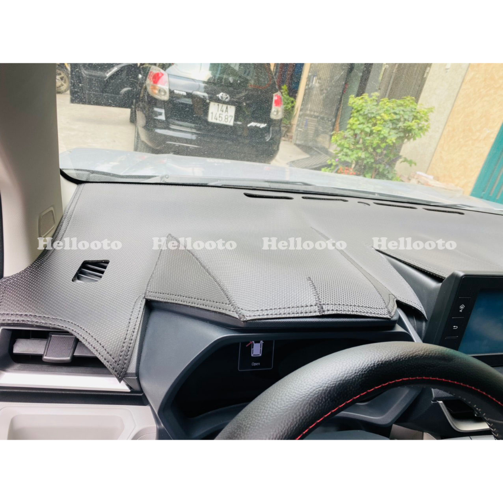 Thảm taplo da carbon xe Toyota Avanza 2022 2023 Màu đen, mặt dưới có chống trượt, chuẩn form xe