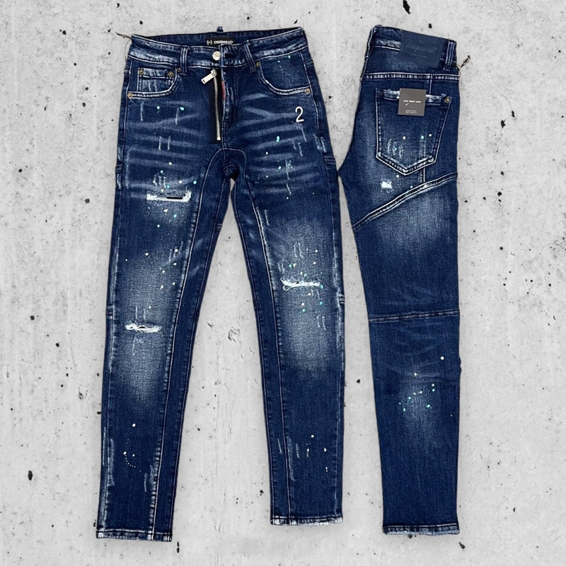 Quần jean bò nam Dsq2 biker côn xanh đậm khoá lệch rách ngang đùi gối vảy sơn tag số 2 đùi cao cấp