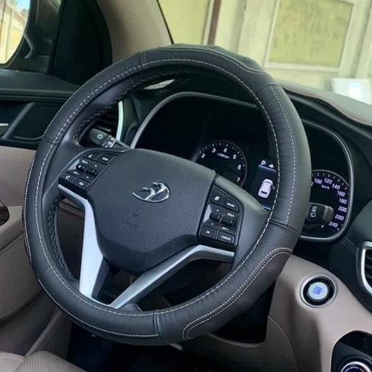 Bọc vô lăng tay lái ô tô xe hơi DA BÒ THẬT cao cấp dành cho xe 4 chỗ 5 chỗ 7 chỗ