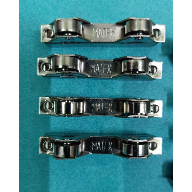 Bánh xe cửa lùa-cửa sổ matex dùng cho cửa kính-nhôm-sắt