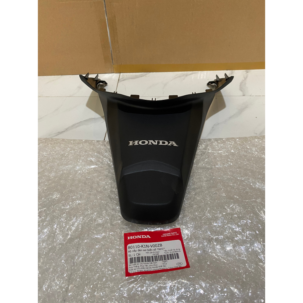 Bộ nắp đèn soi biển số HONDA SH MODE năm 2021-2022-2023 màu Đen. Mã SP 80110K1NV00ZB