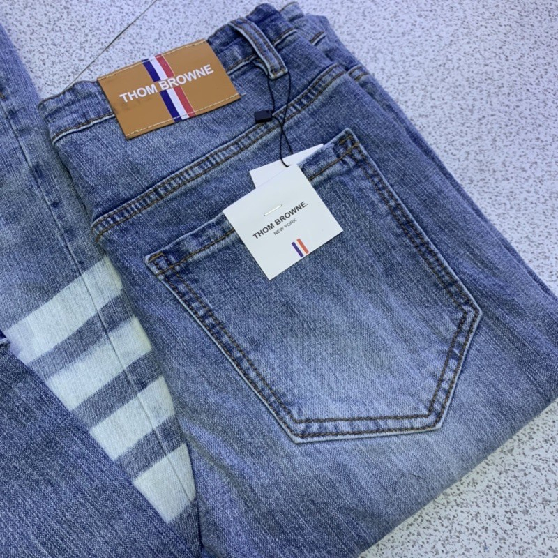 Quần JEANS THOME 4 Vạch Trắng Nam Quần bò nam Thom 4 sọc Trơn Phối Dập Kẻ Trắng Đùi hot trend 2023