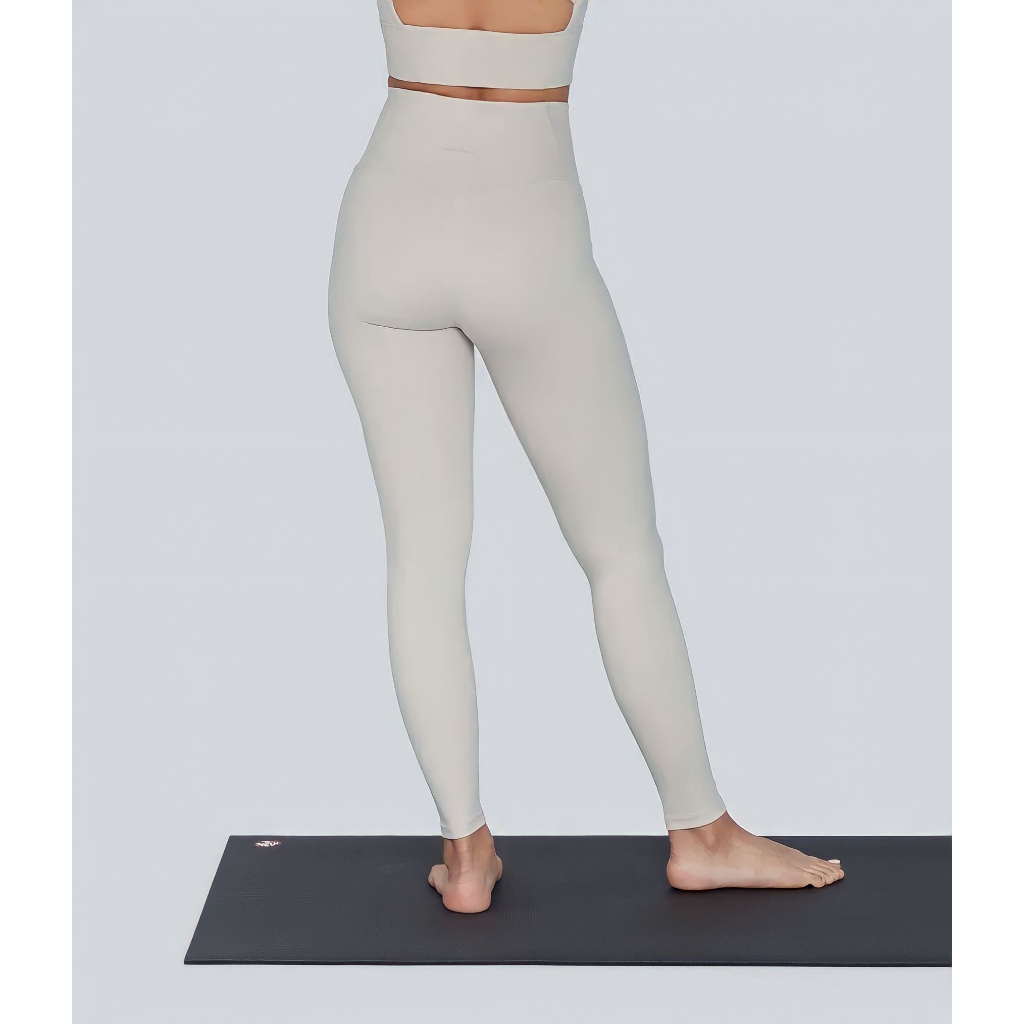 Legging trơn Manduka túi lưng sau
