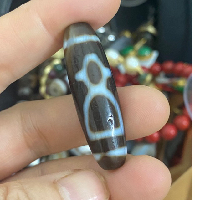 Dzi thần tài đang phong hóa, thân cao dầu, sâu tuổi