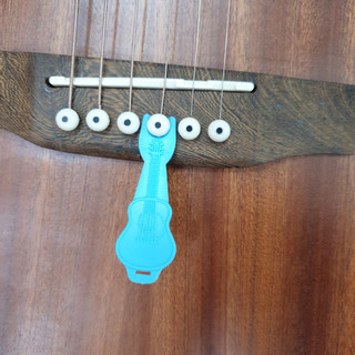Thanh cậy nút chặn đàn guitar