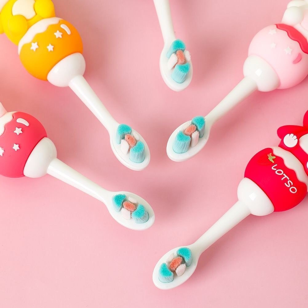 Bàn chải đánh răng cho bé 2-7y tay cầm nghộ nghĩnh