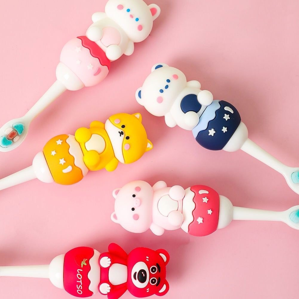 Bàn chải đánh răng cho bé 2-7y tay cầm nghộ nghĩnh