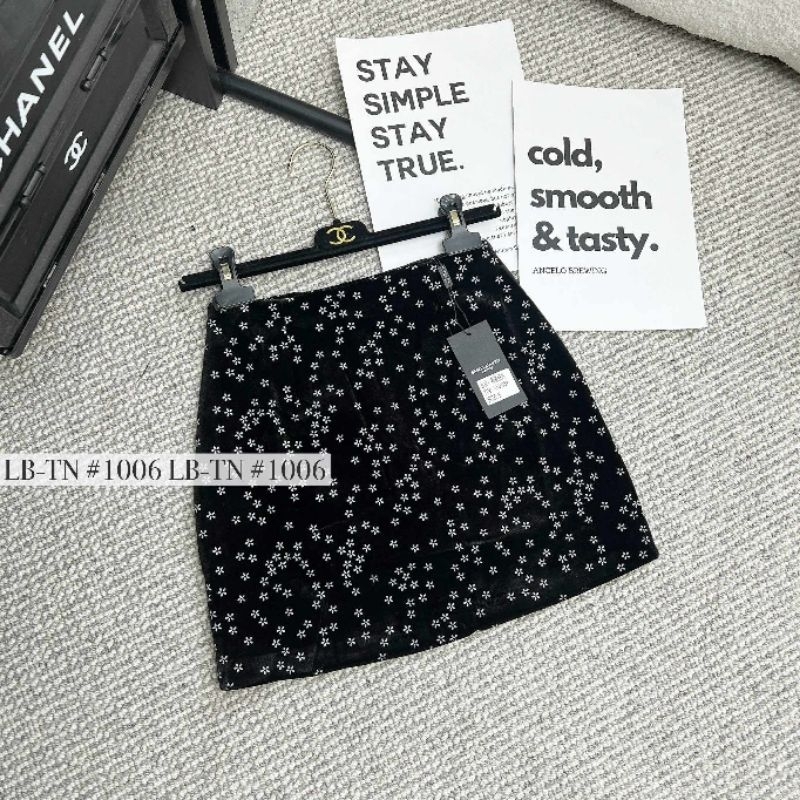 Chân váy nhung hoa hàng QC