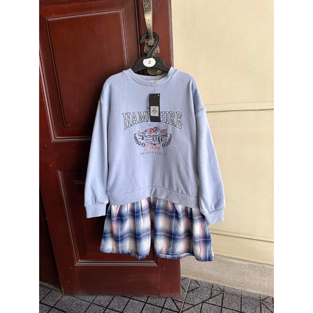 Váy nỉ xanh chân kẻ bé gái prima