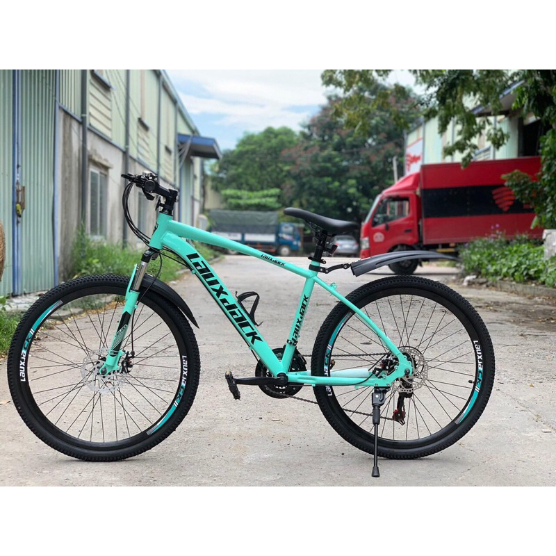 Xe đạp ngoài trời Laux Jack có giảm sốc, kèm chắn bùn, còi, đèn phản quang, bánh 26inch, 21 tốc độ