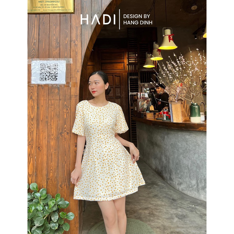 Đầm hoa vàng tay bí thắt nơ eo - Nhi