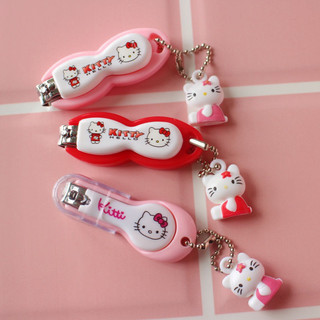 Bấm móng tay hình Hello Kitty và Doremon