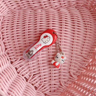 Bấm móng tay hình Hello Kitty và Doremon