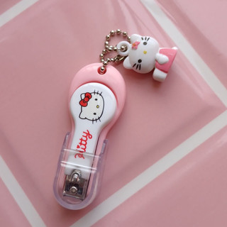 Bấm móng tay hình Hello Kitty và Doremon