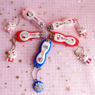 Bấm móng tay hình Hello Kitty và Doremon