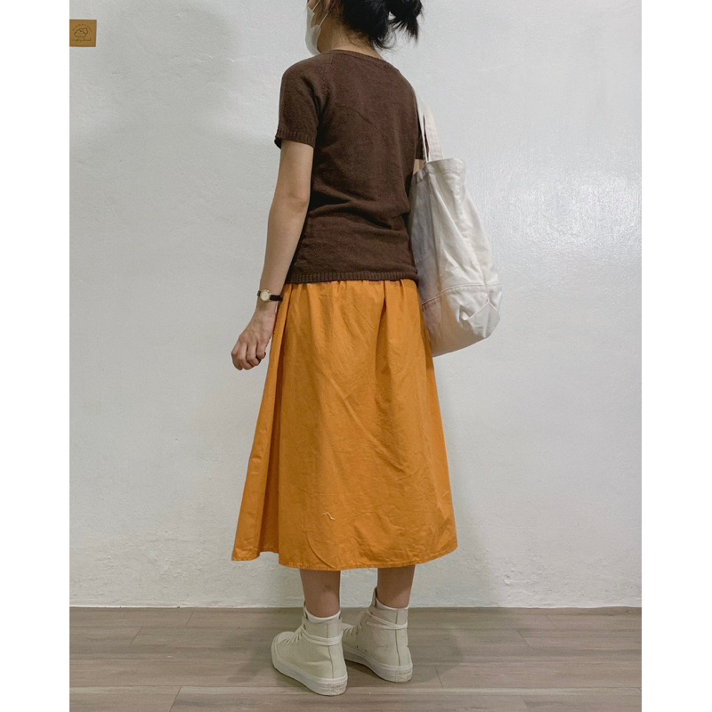 Chân váy xô cam chất thô 2hand / Instagram: maybay.2hand