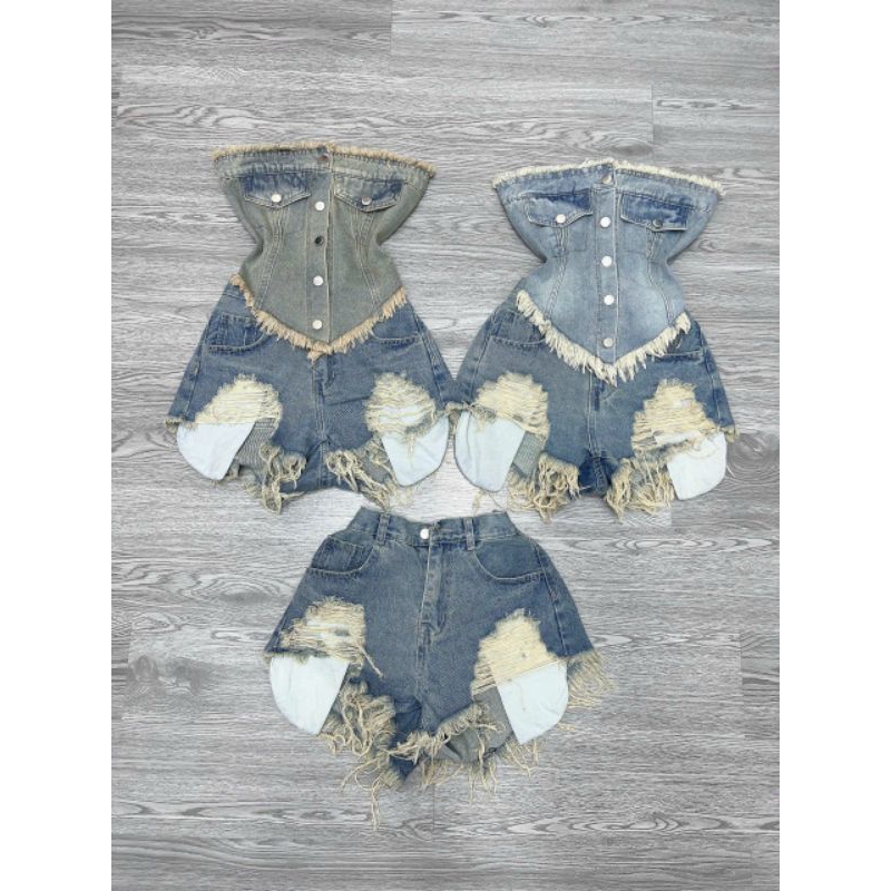Quần short denim rách lưng cao phối túi tua rua