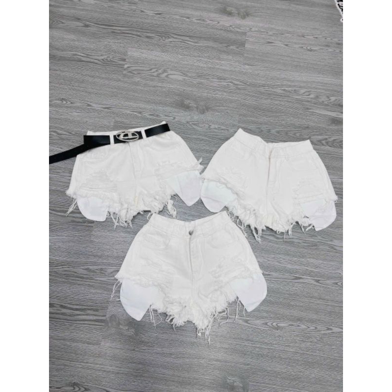 Quần short denim rách lưng cao phối túi tua rua