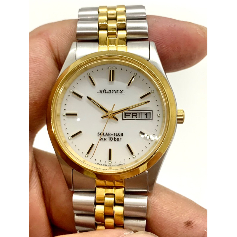 Đồng hồ pin năng lượng nam hiệu Sharex đờ mi vàng - Chính hãng