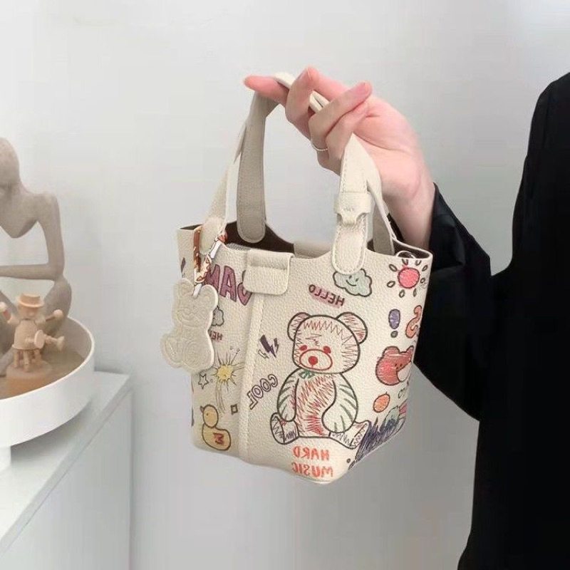 Túi Xách Bucket đeo vai họa tiết Graffiti mẫu mới 2023 thời trang cho nữ TC01