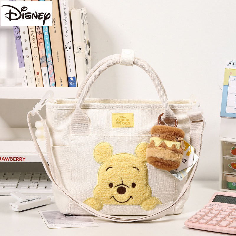 Túi đeo chéo canvas Gấu Pooh kèm charm chính hãng Disney