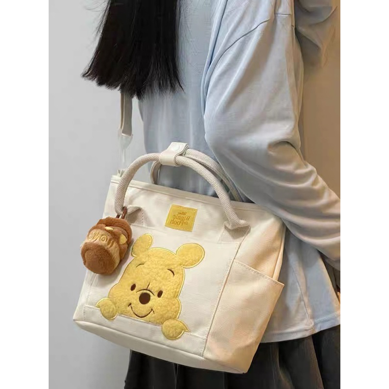 Túi đeo chéo canvas Gấu Pooh kèm charm chính hãng Disney