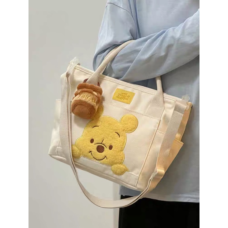 Túi đeo chéo canvas Gấu Pooh kèm charm chính hãng Disney