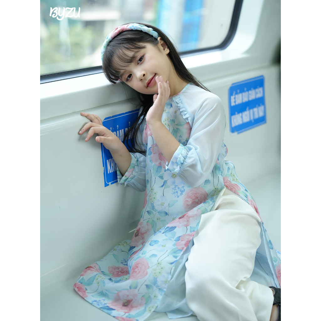 Áo Dài Cách Tân Bé Gái BYZU Chất Vải Tơ Hoa Nhí Cổ Tròn, Tay Bồng Màu Pastel ADT2303