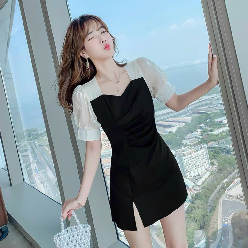 Đầm váy freesize đen phối trắng xẻ tà