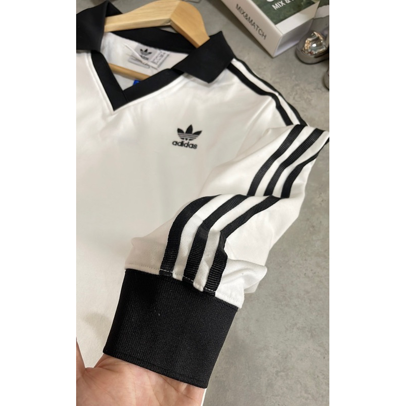 ÁO POLO CỔ V ADI.DASS SỌC BACSIC