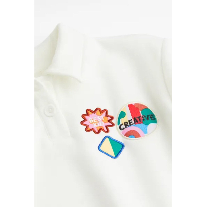 Áo Nỉ Polo Bé Gái Thêu Stick Trắng HaM